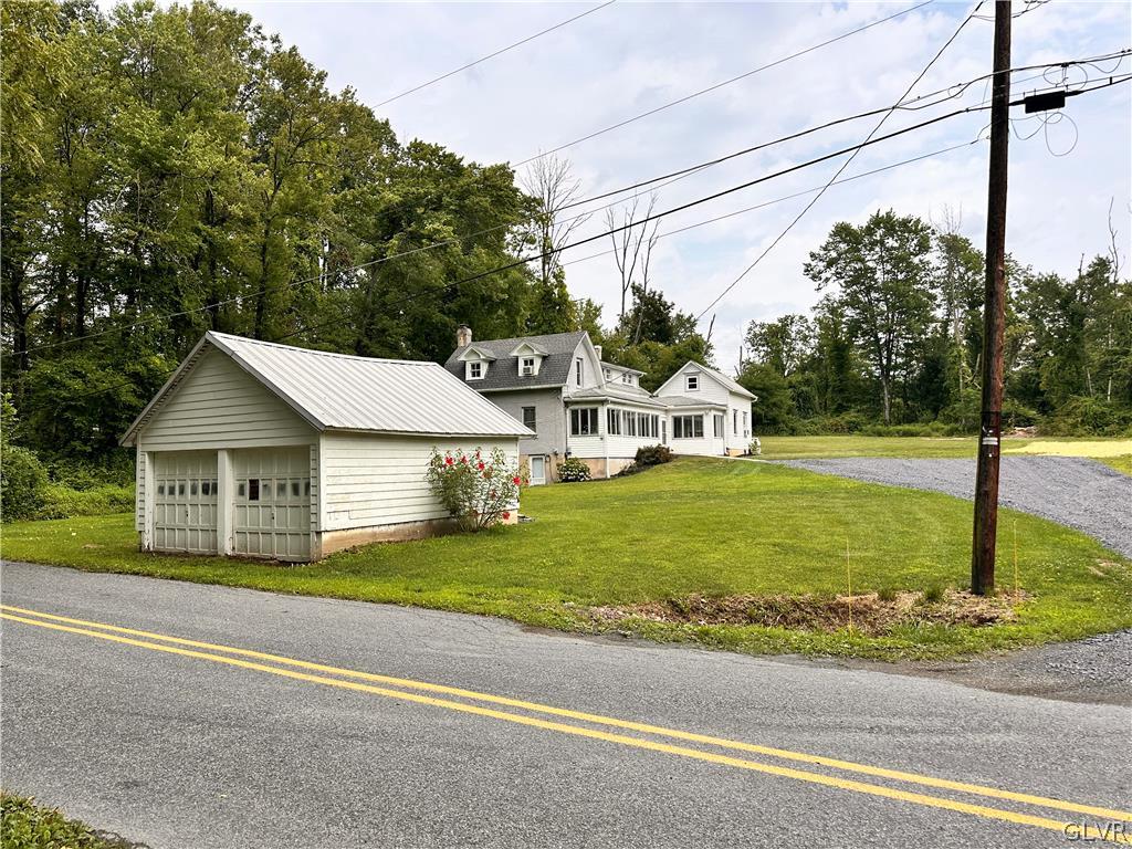 8547 Deer Road Slatington, PA 18080 - Photo 4 of 32 a view of a house with a big yard and large tree