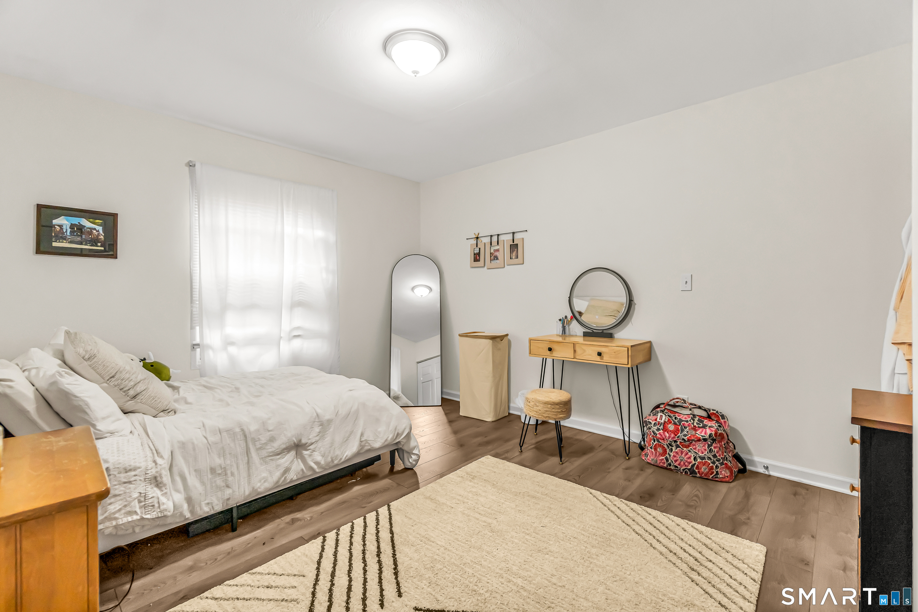 252 Bear Paw Road Bridgeport, CT 06606 - Photo 16 of 25 a bedroom with bed and a window