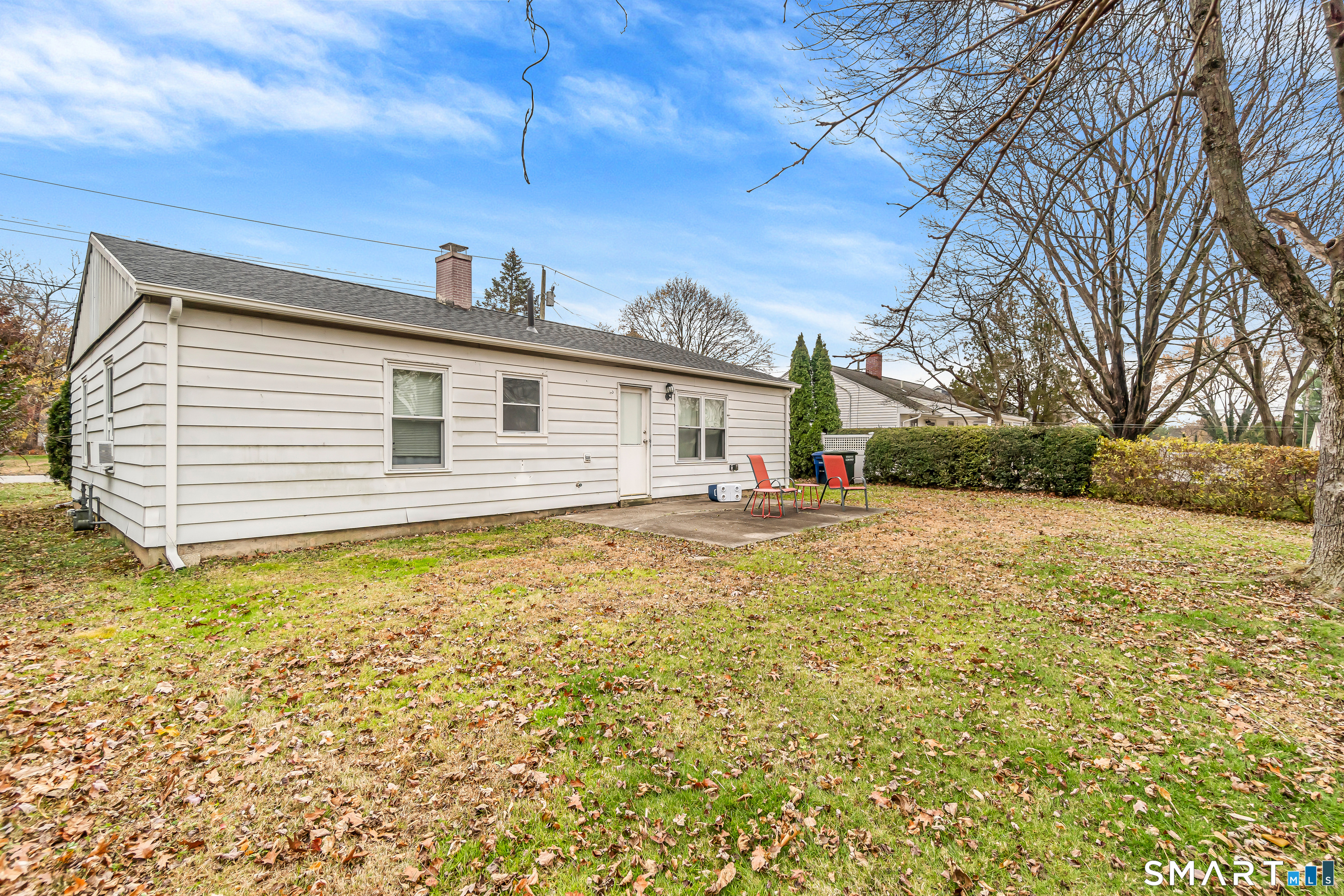 252 Bear Paw Road Bridgeport, CT 06606 - Photo 22 of 25 a front view of a house with a yard