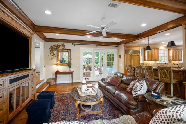a spacious bathroom with a granite countertop tub sink and mirror