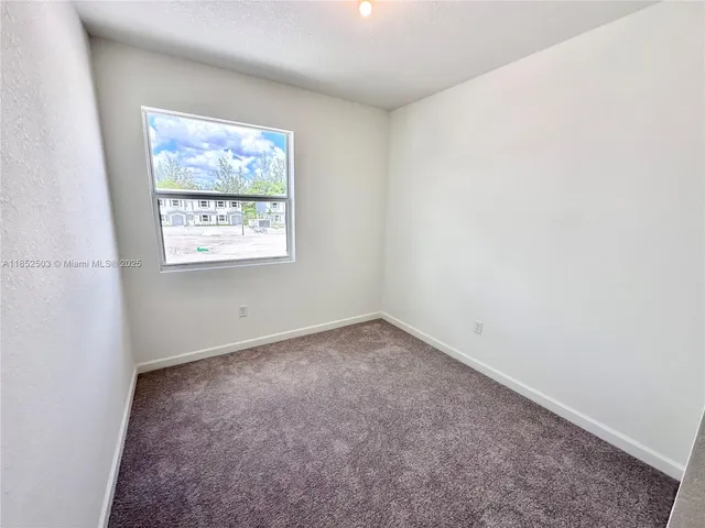 a close up of a white wall