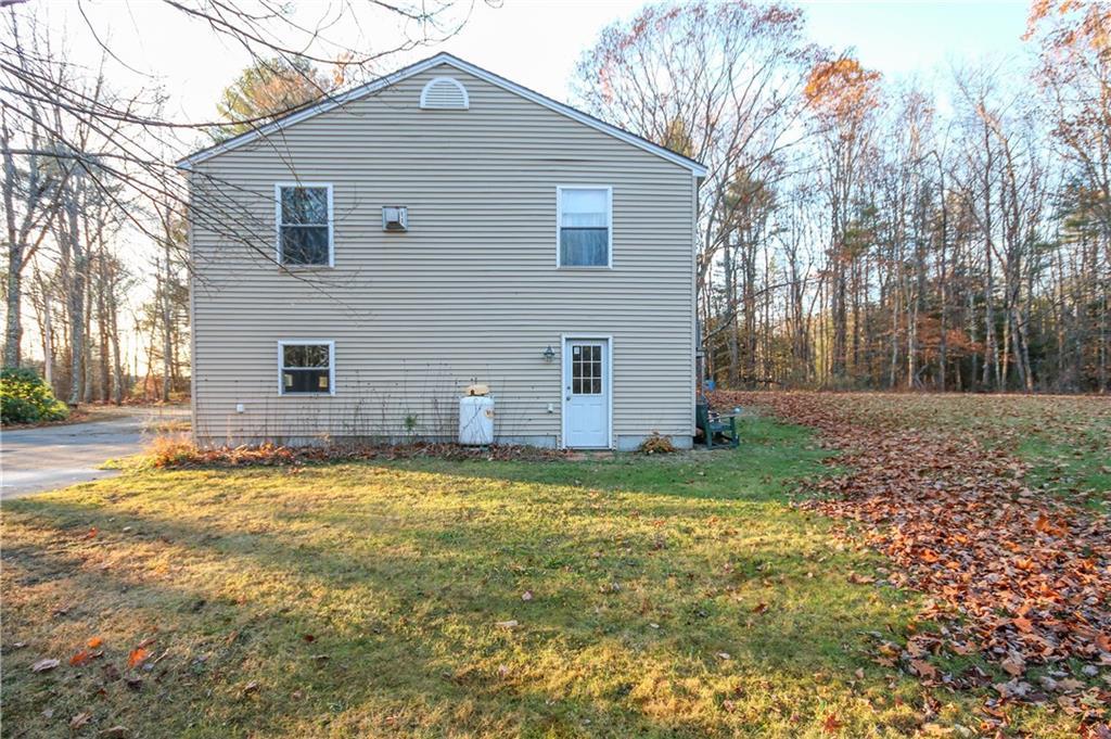83 Blanchard Road Cumberland, ME 04021 - Photo 30 of 35 Sideyard. Side Entrance to Garage.