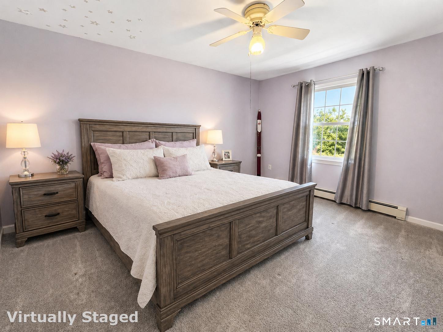 11 Wheeler Farm Road Preston, CT 06365 - Photo 26 of 40 a spacious bedroom with a bed and a chandelier