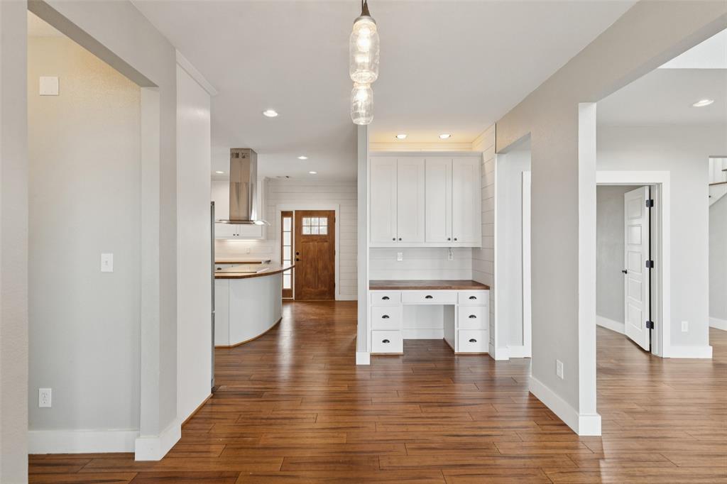 155 North Armstrong Road Venus, TX 76084 - Photo 13 of 38 a view of kitchen with wooden floor and electronic appliances