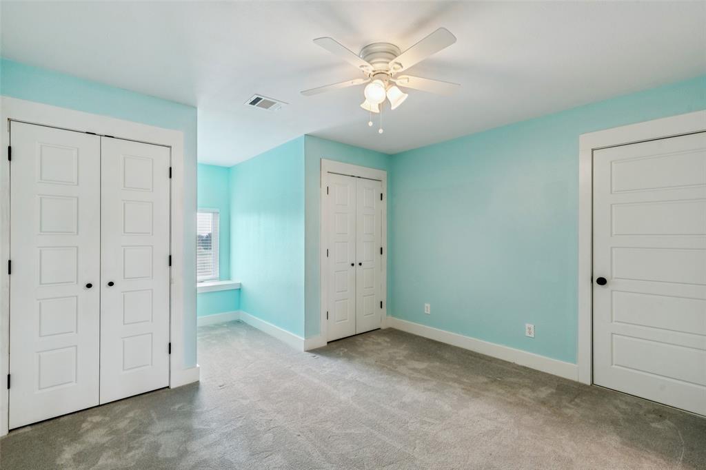 155 North Armstrong Road Venus, TX 76084 - Photo 22 of 38 an empty room with a ceiling fan