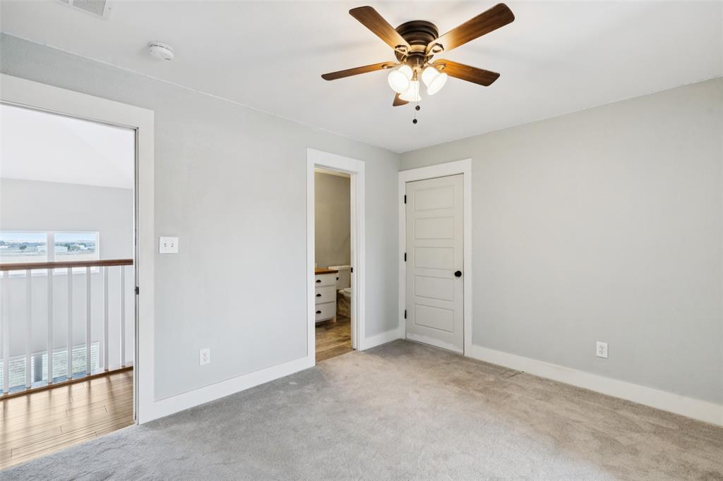 155 North Armstrong Road Venus, TX 76084 - Photo 24 of 38 wooden floor in an empty room with a window