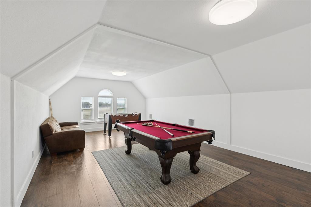 155 North Armstrong Road Venus, TX 76084 - Photo 26 of 38 a living room with furniture a rug and a potted plant