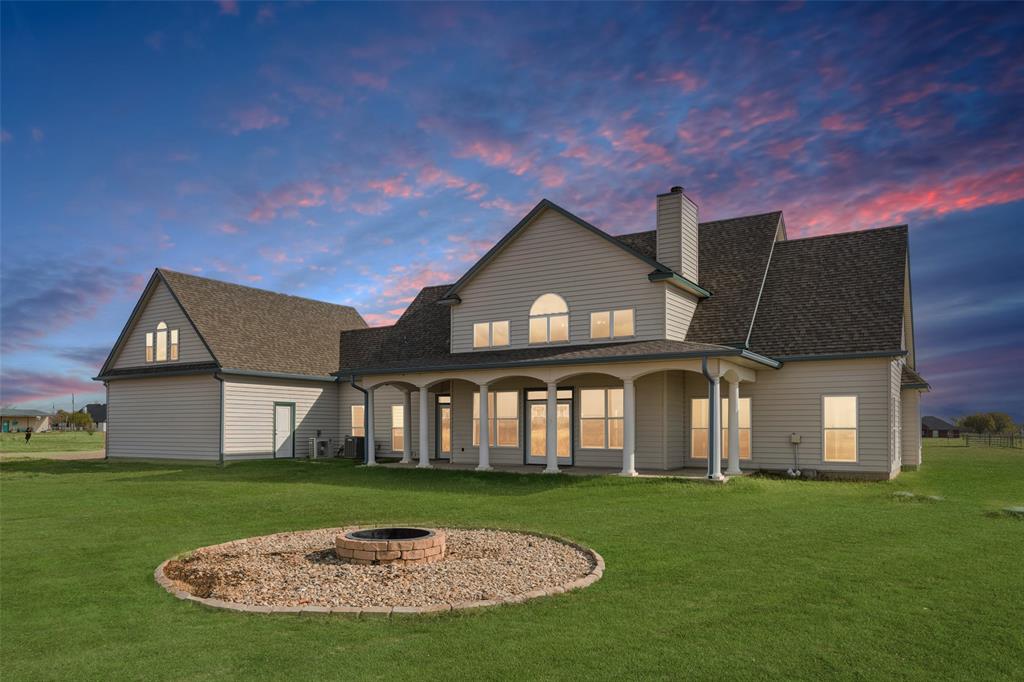 155 North Armstrong Road Venus, TX 76084 - Photo 31 of 38 a front view of a house with a garden