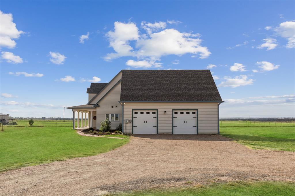 155 North Armstrong Road Venus, TX 76084 - Photo 32 of 38 a view of a house with a yard