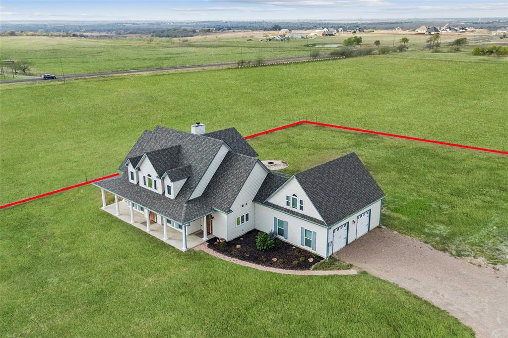 155 North Armstrong Road Venus, TX 76084 - Photo 34 of 38 a view of a garden with an ocean