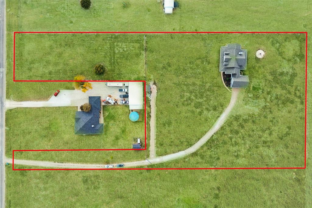 155 North Armstrong Road Venus, TX 76084 - Photo 35 of 38 a view of a floor to ceiling window and a yard