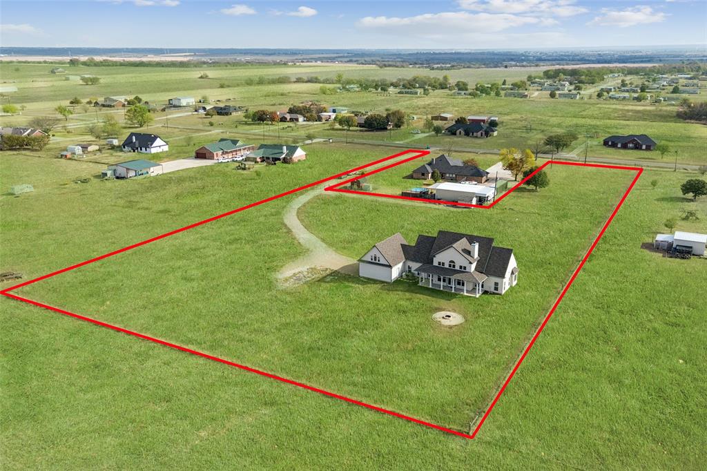 155 North Armstrong Road Venus, TX 76084 - Photo 36 of 38 a view of a field with an ocean