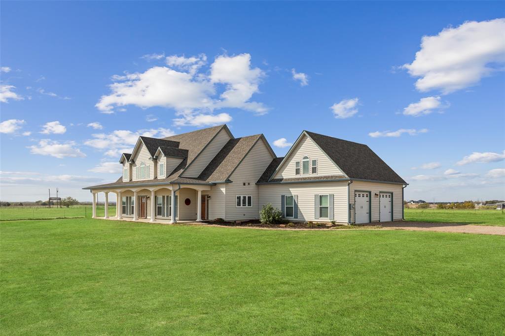 155 North Armstrong Road Venus, TX 76084 - Photo 4 of 38 a front view of house with yard and green space