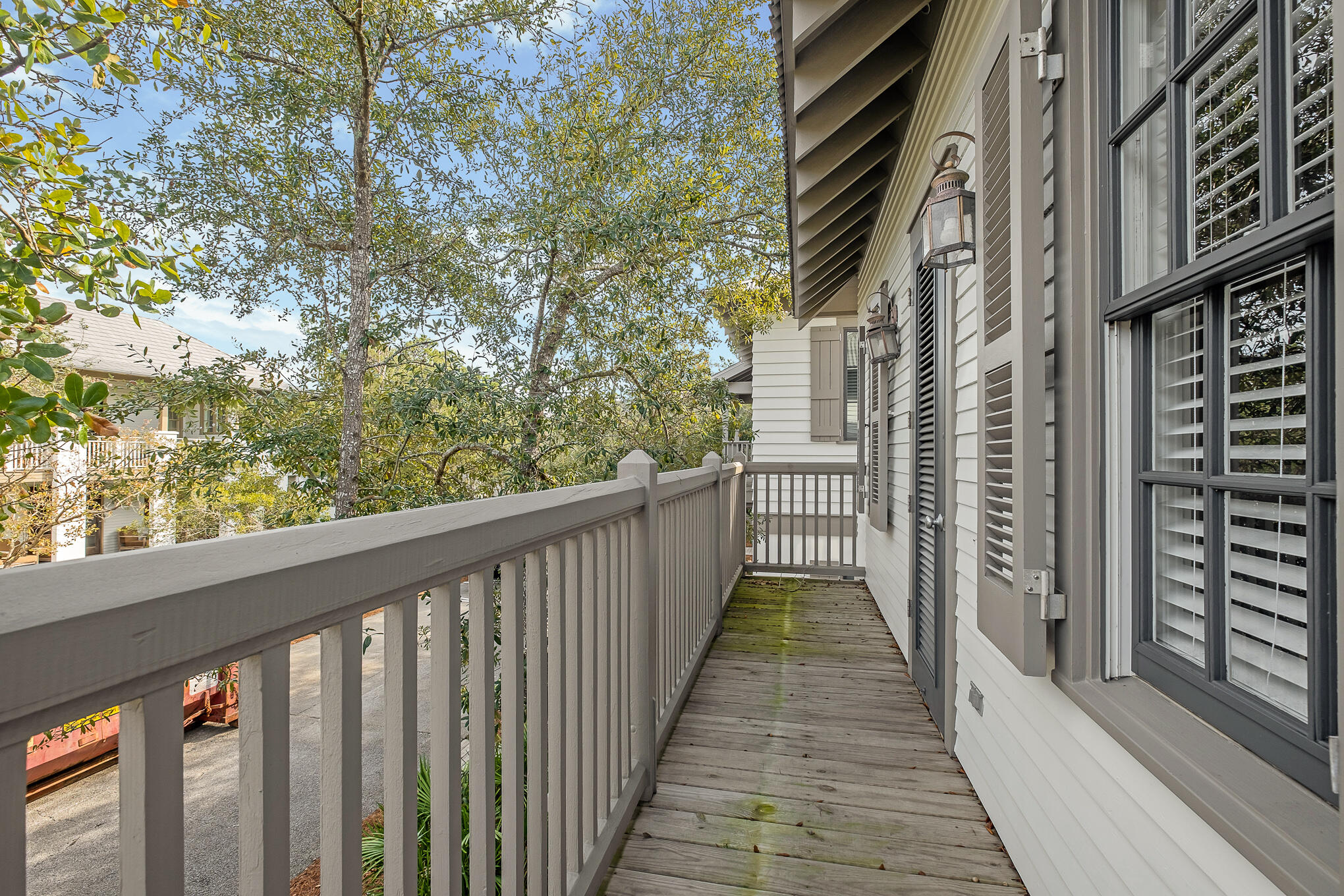 144 Round Rd Inlet Beach Inlet Beach, FL 32461 - Photo 38 of 56 a view of a balcony with wooden floor and fence