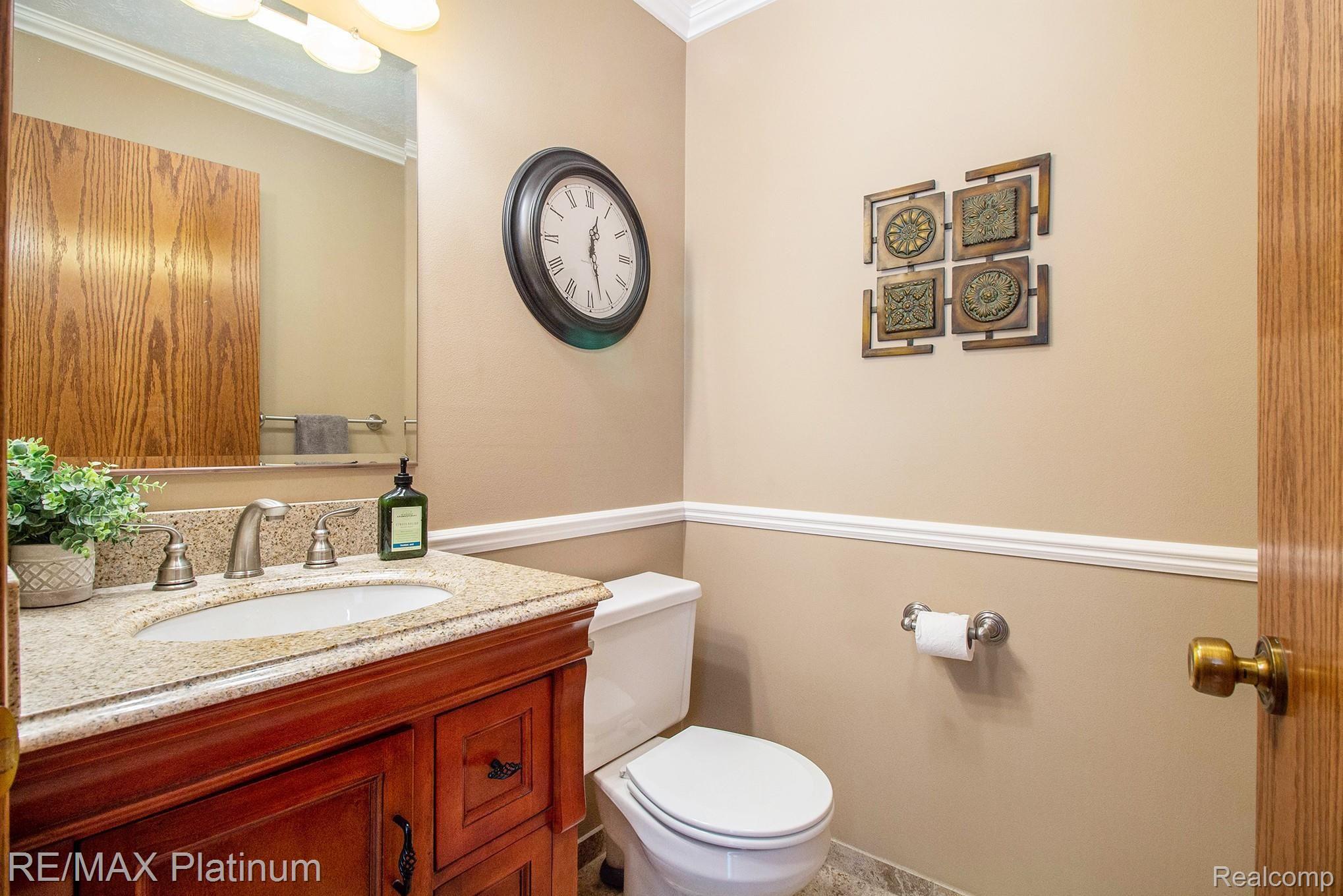 1495 Woodhaven Road Howell, MI 48855 - Photo 13 of 26 Powder Room.jpg