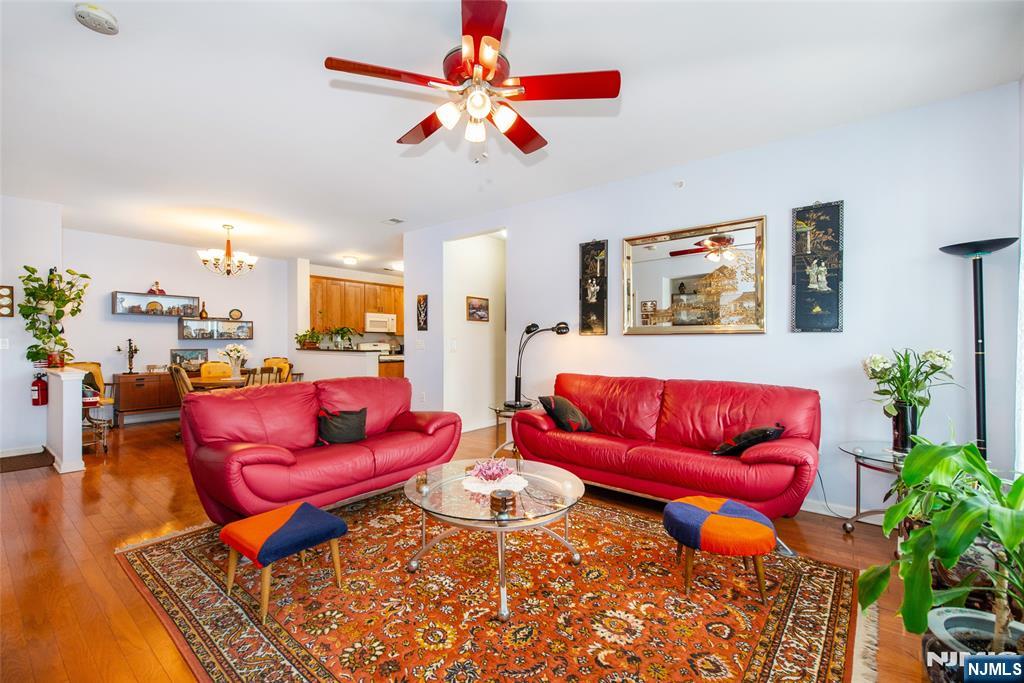9 Cliff Road Woodland Park, NJ 07424 - Photo 20 of 25 a living room with furniture kitchen view and a table