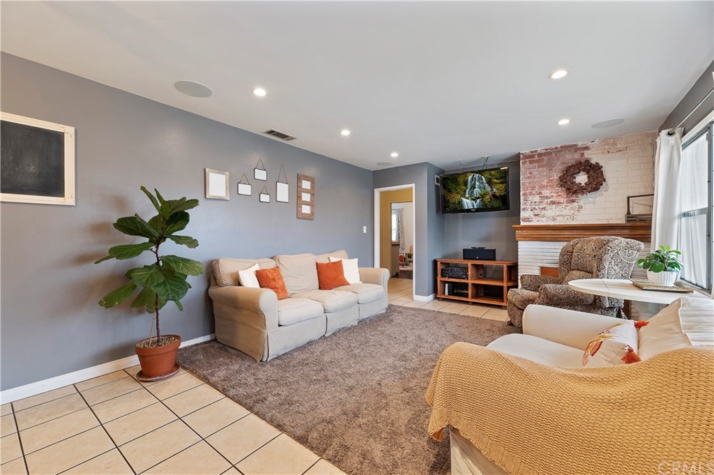 4140 St George Place Riverside, CA 92504 - Photo 14 of 29 a living room with furniture and wooden floor