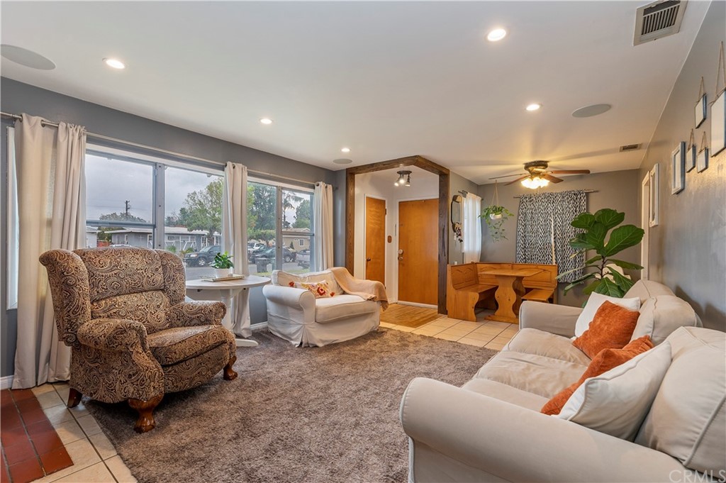 4140 St George Place Riverside, CA 92504 - Photo 18 of 29 a living room with furniture and a large window