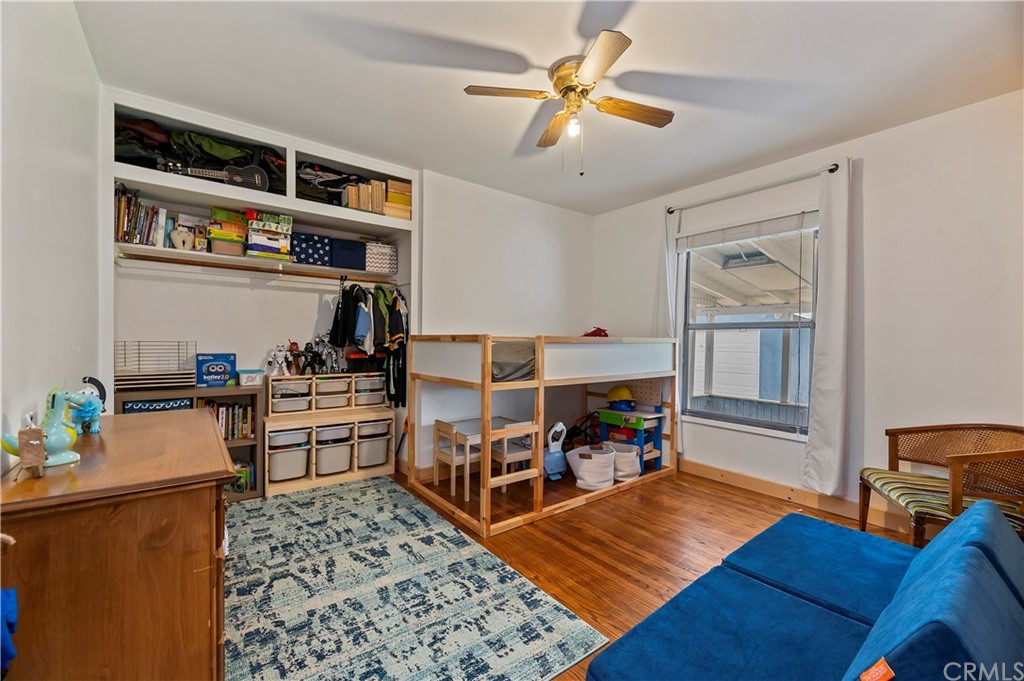 4140 St George Place Riverside, CA 92504 - Photo 23 of 29 a bed room with a bed and a cabinets