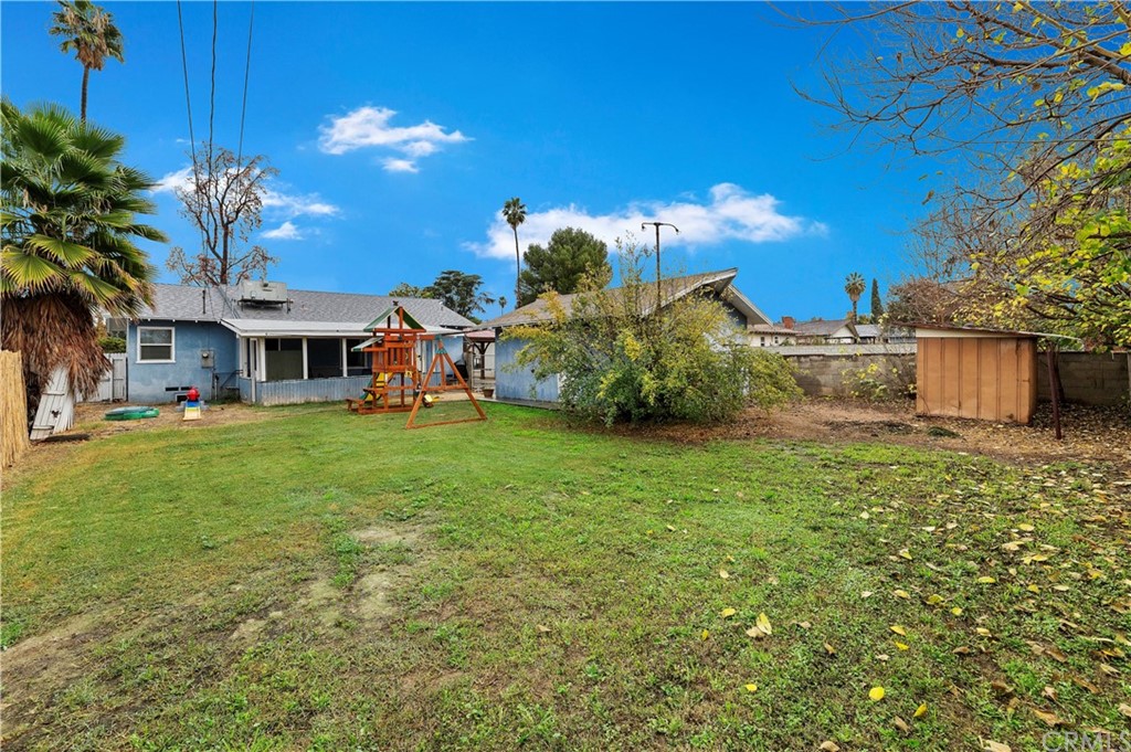 4140 St George Place Riverside, CA 92504 - Photo 9 of 29 a view of a house with a backyard