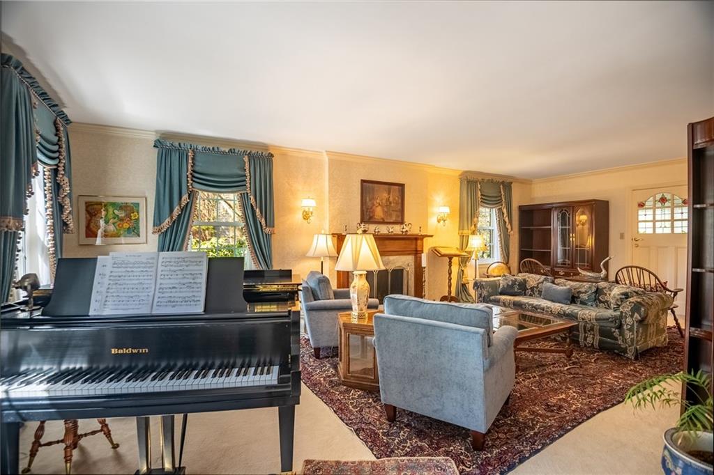1355 Yahres Road Sharon, PA 16146 - Photo 18 of 33 a living room with fireplace furniture and a window
