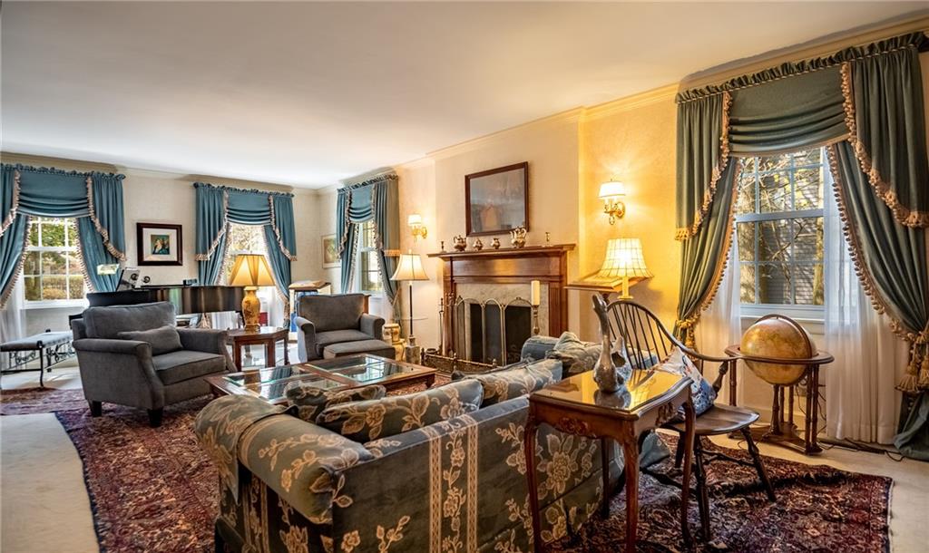 1355 Yahres Road Sharon, PA 16146 - Photo 20 of 33 a living room with furniture and a fireplace