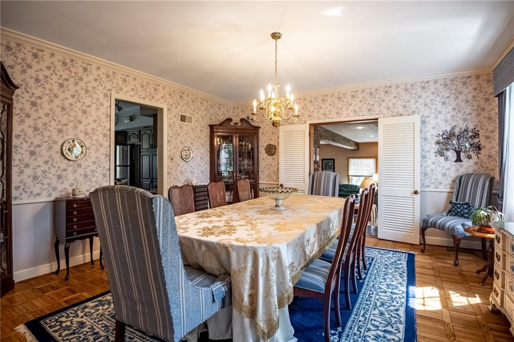 1355 Yahres Road Sharon, PA 16146 - Photo 21 of 33 a view of a dining room with furniture and wooden floor