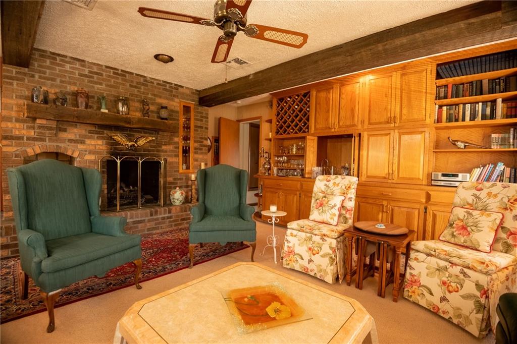 1355 Yahres Road Sharon, PA 16146 - Photo 23 of 33 a living room with furniture a ceiling fan and a rug