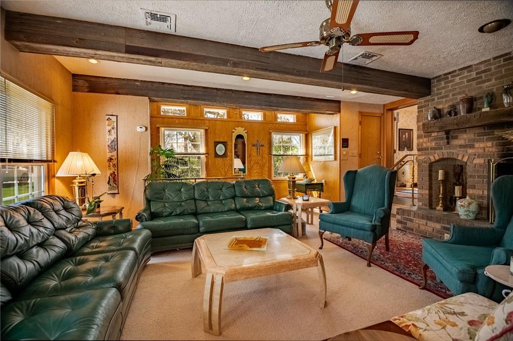 1355 Yahres Road Sharon, PA 16146 - Photo 24 of 33 a living room with furniture and a floor to ceiling window