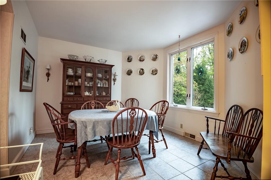 1355 Yahres Road Sharon, PA 16146 - Photo 25 of 33 a view of a dining room with furniture window and outside view