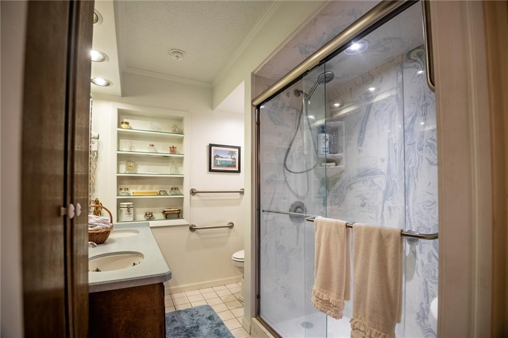 1355 Yahres Road Sharon, PA 16146 - Photo 33 of 33 a bathroom with a sink a toilet and shower