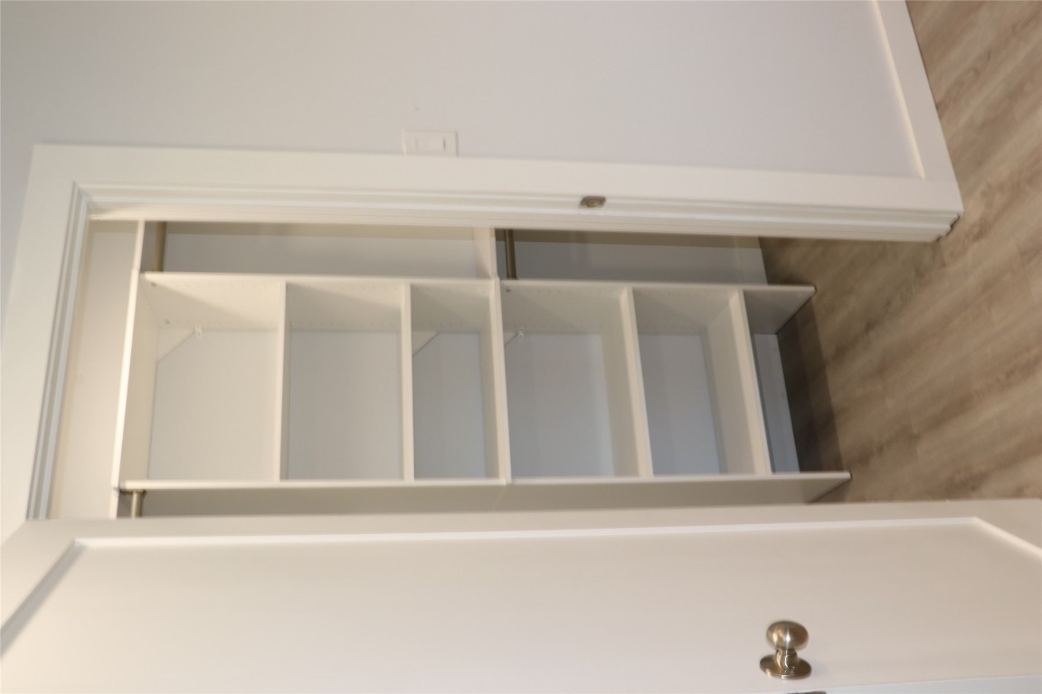 8903 Mesa Drive, Unit A Austin, TX 78759 - Photo 23 of 27 a view of a room with rack on the wall