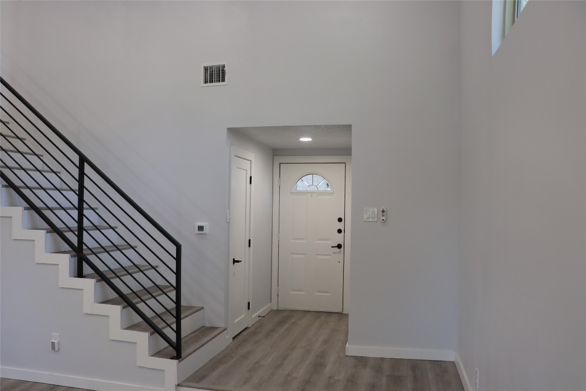 8903 Mesa Drive, Unit A Austin, TX 78759 - Photo 6 of 27 a view of a hallway with staircase