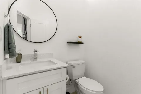a view of bathroom with a washer and dryer