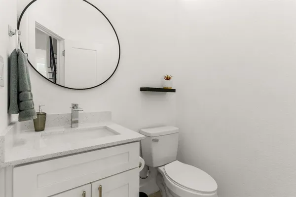 a view of bathroom with a washer and dryer