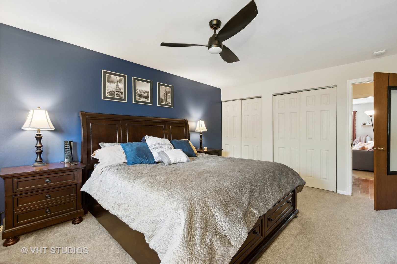 618 North Rohlwing Road Palatine, IL 60074 - Photo 14 of 23 a bedroom with a bed and a lamp on a dresser