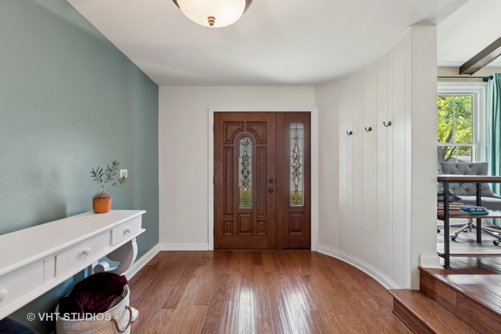 618 North Rohlwing Road Palatine, IL 60074 - Photo 8 of 23 a view of livingroom with furniture and wooden floor