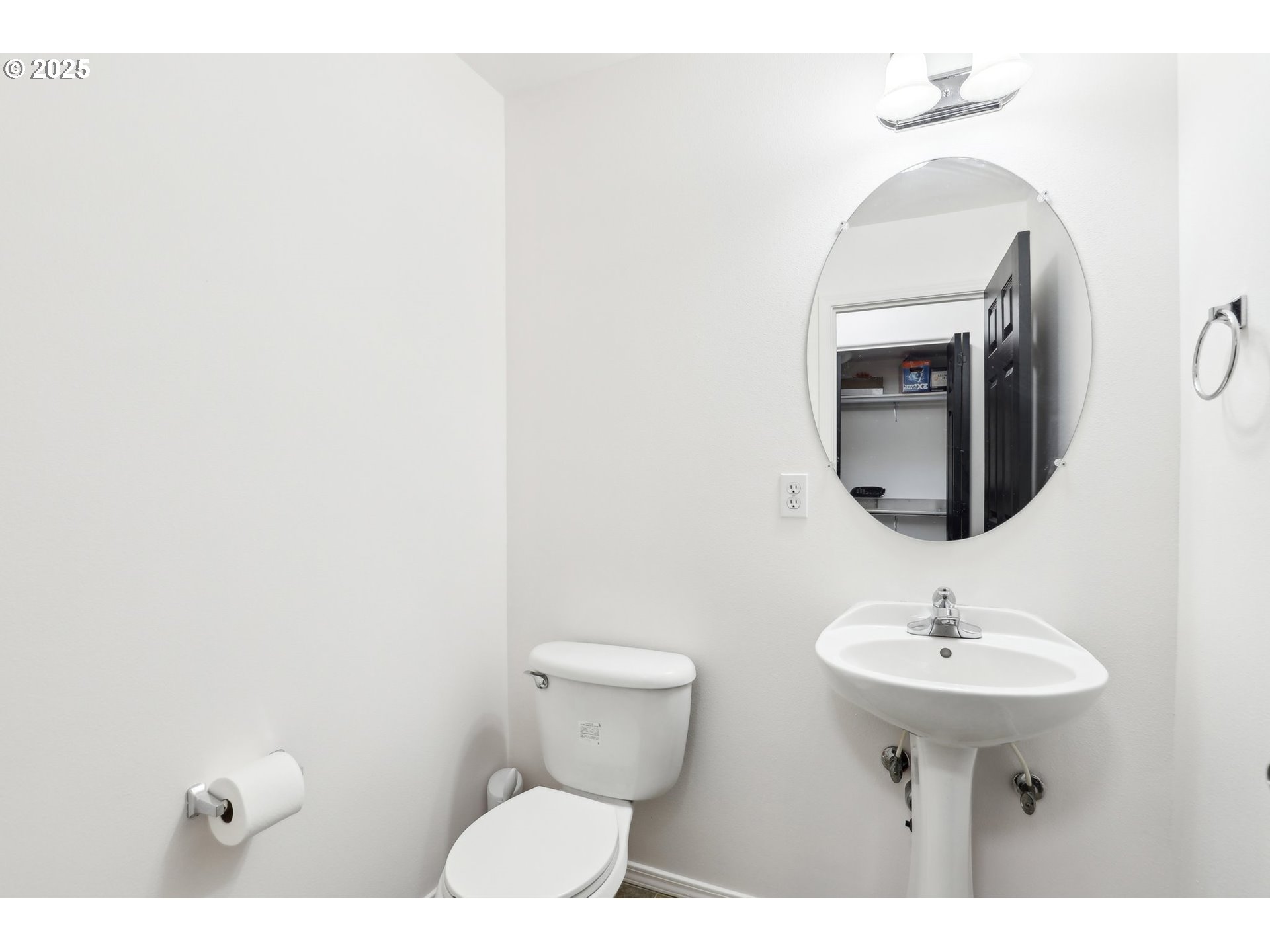 19153 Southeast Yamhill Street, Unit 21 Portland, OR 97233 - Photo 9 of 22 a bathroom with a toilet sink and mirror