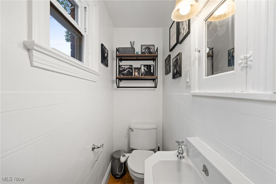 2344 Ashurst Road Cleveland, OH 44118 - Photo 14 of 34 Bathroom with toilet and tile walls