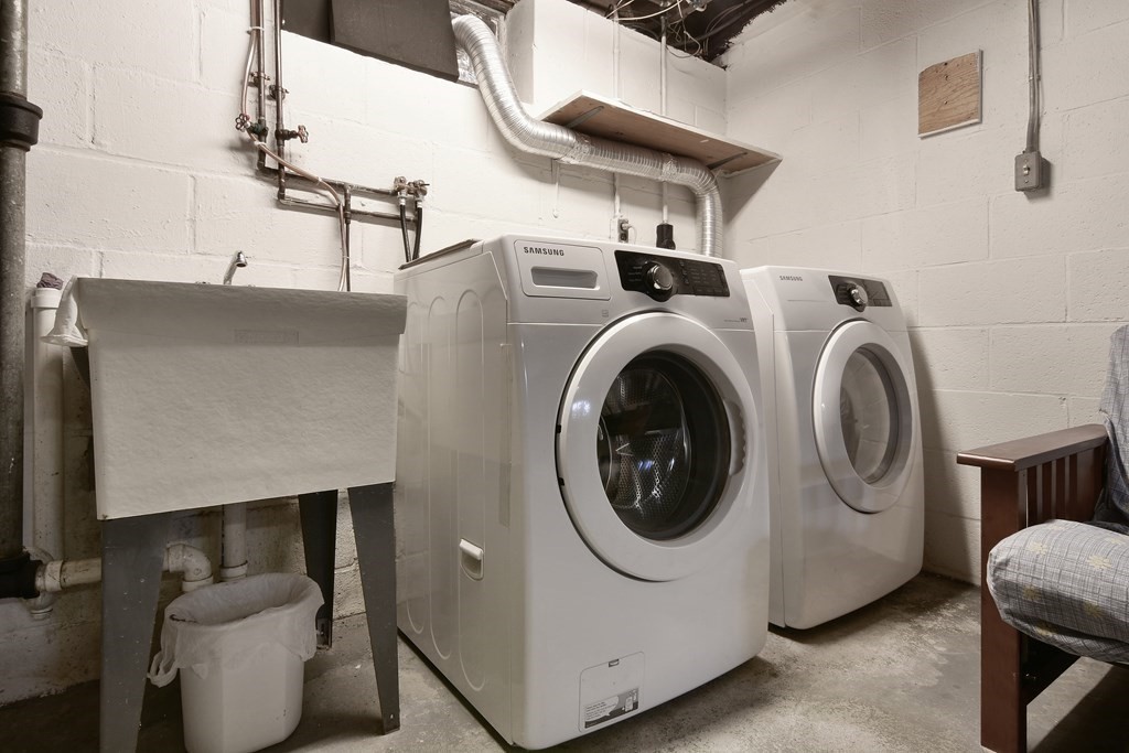 130 Florence Road Waltham, MA 02453 - Photo 22 of 26 a utility room with dryer and washer