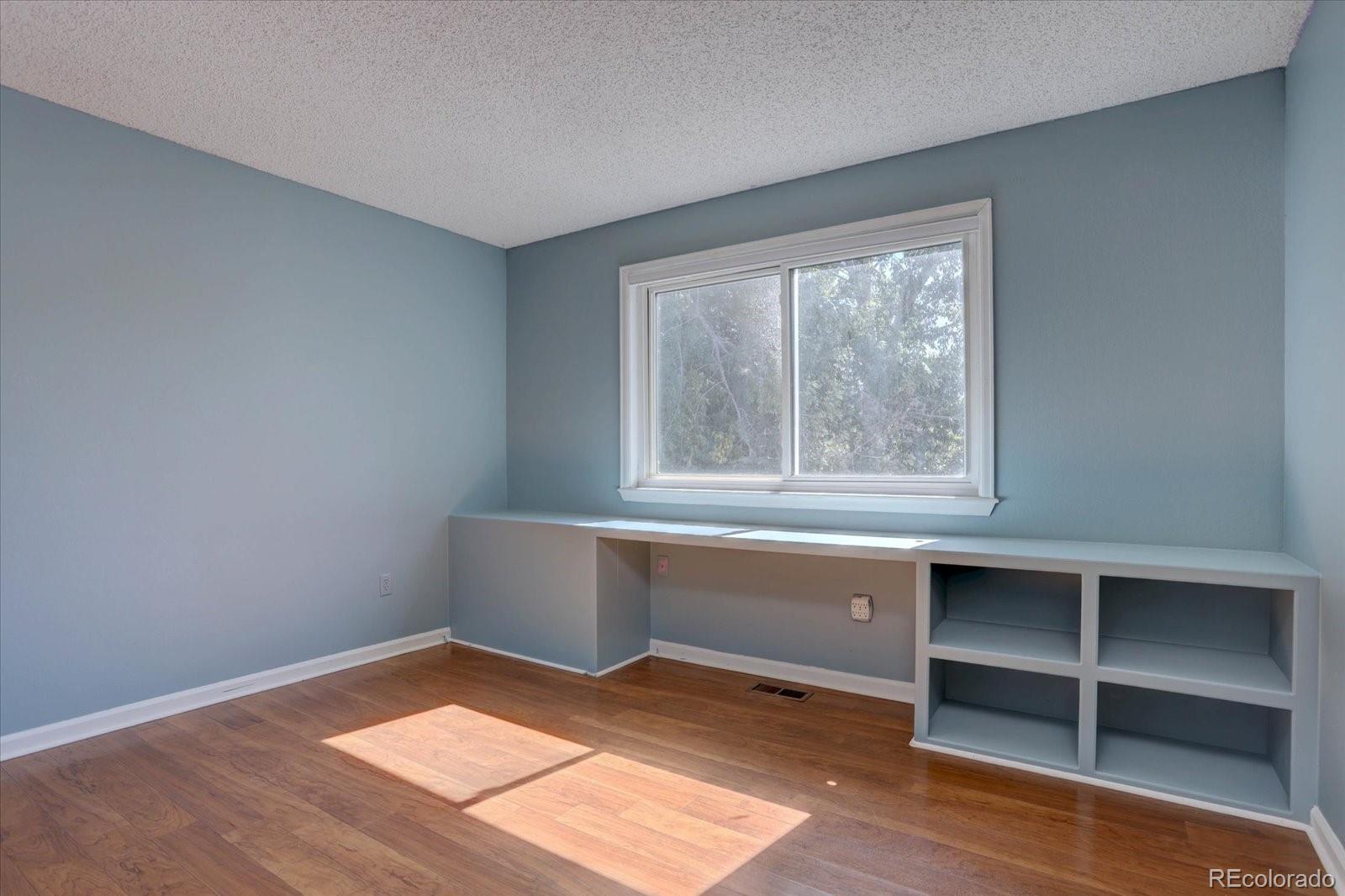 10312 Stoneflower Drive Parker, CO 80134 - Photo 27 of 43 a room with a window