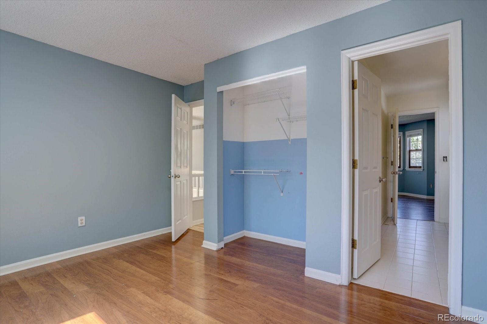 10312 Stoneflower Drive Parker, CO 80134 - Photo 28 of 43 wooden floor in an empty room