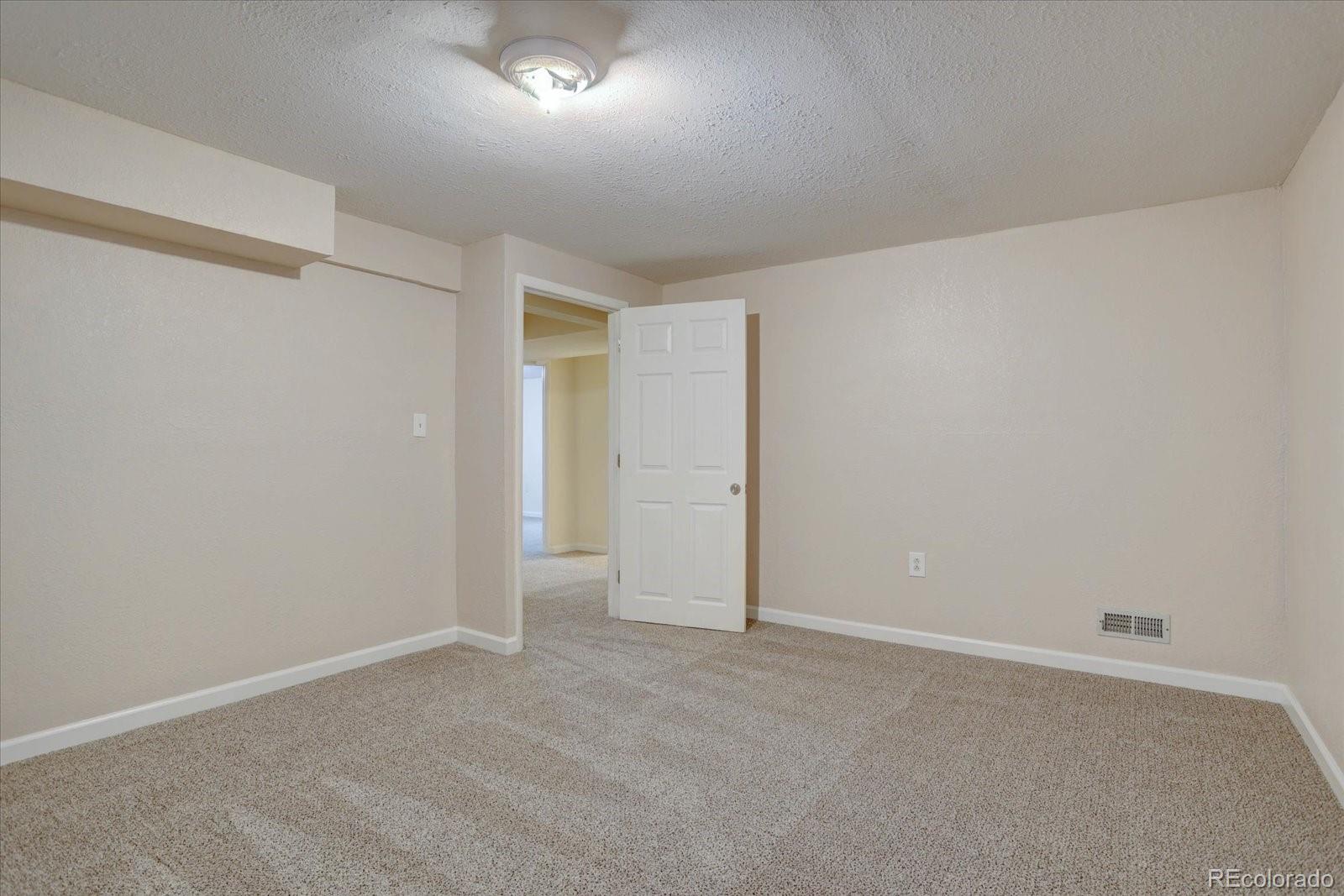 10312 Stoneflower Drive Parker, CO 80134 - Photo 30 of 43 a view of an empty room