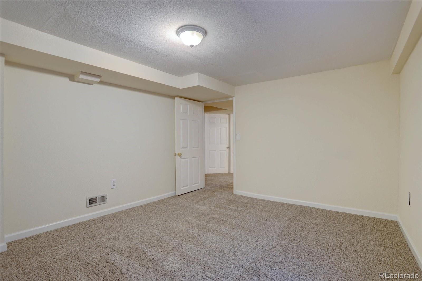 10312 Stoneflower Drive Parker, CO 80134 - Photo 32 of 43 a view of an empty room