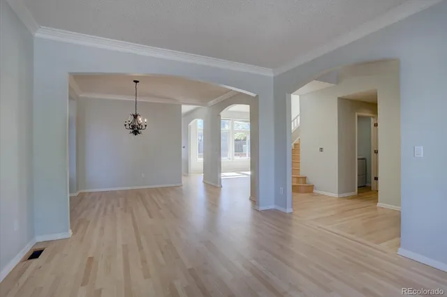 a view of a livingroom with wooden floor