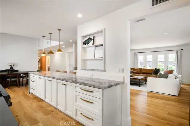 a kitchen with granite countertop lots of counter top space