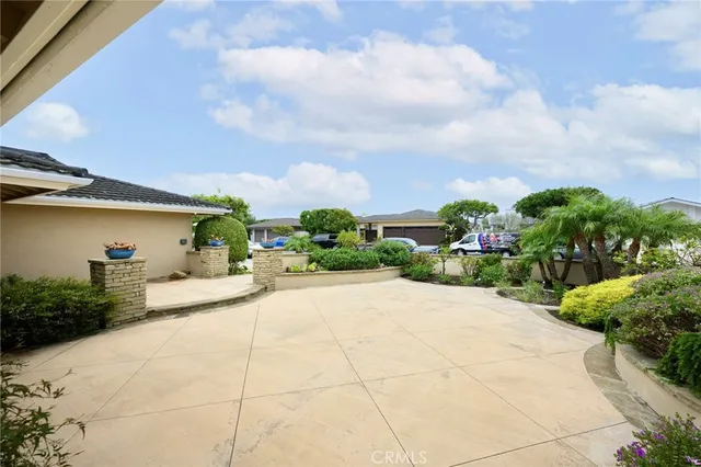 a house with garden in front of it
