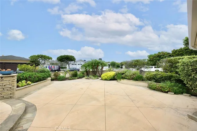 a view of a garden with potted plants