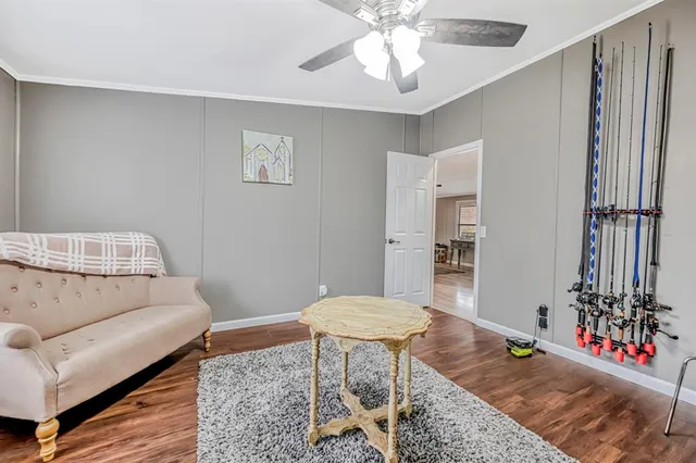 a living room with furniture and a rug
