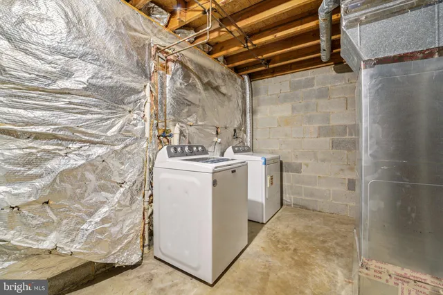 a aerial view of a house with a yard